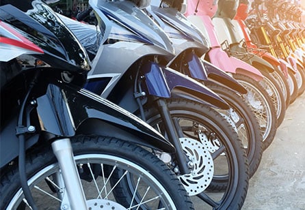 Motorbikes lined up in a row
